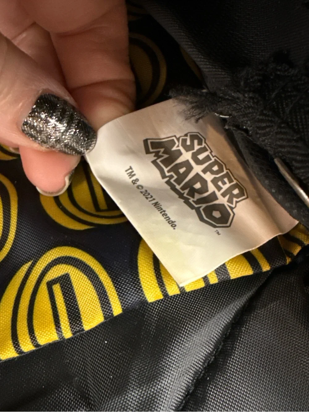 Nintendo Super Mario Black and Yellow Logo Backpack